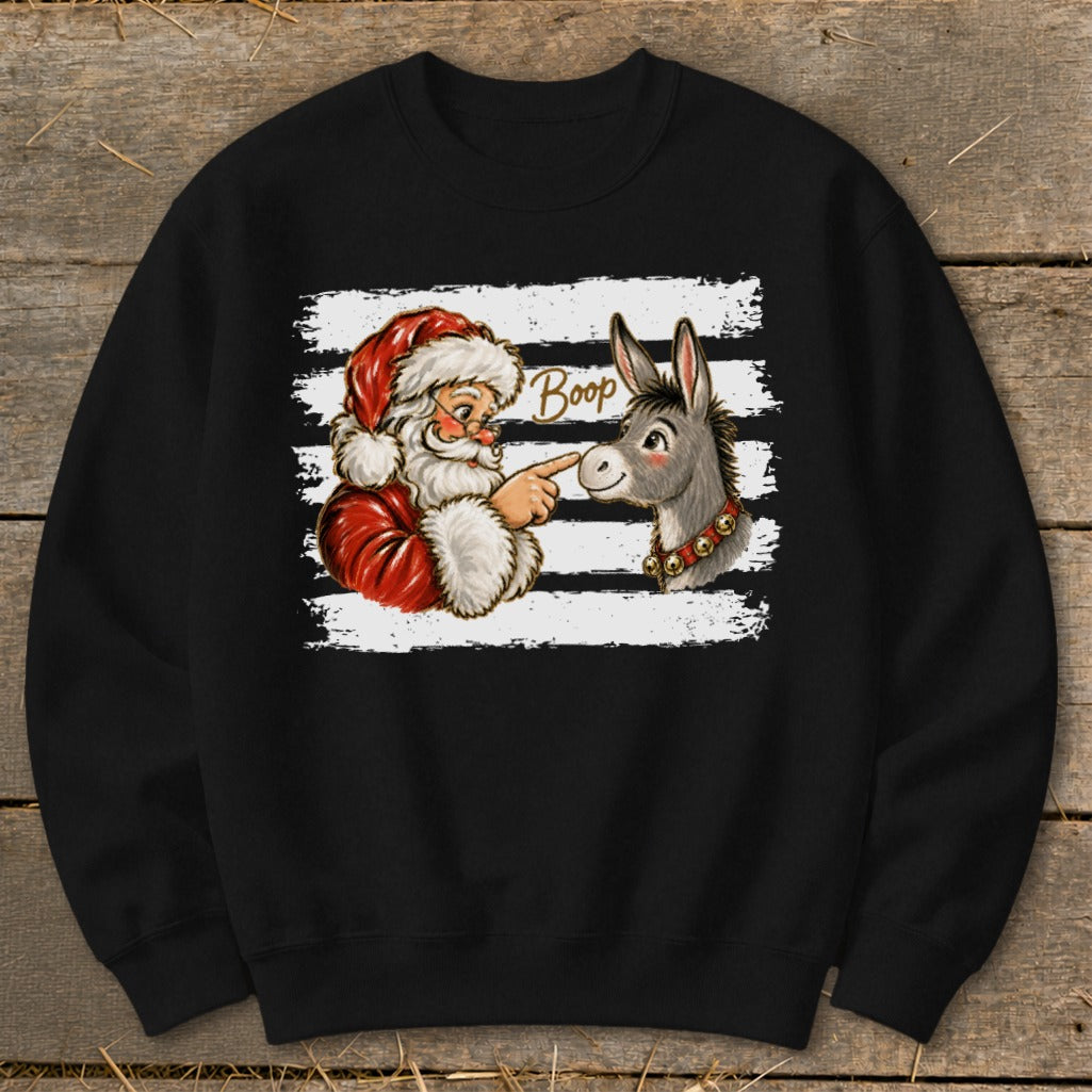 Santa booping a donkey with text "Boop" on a black sweatshirt.