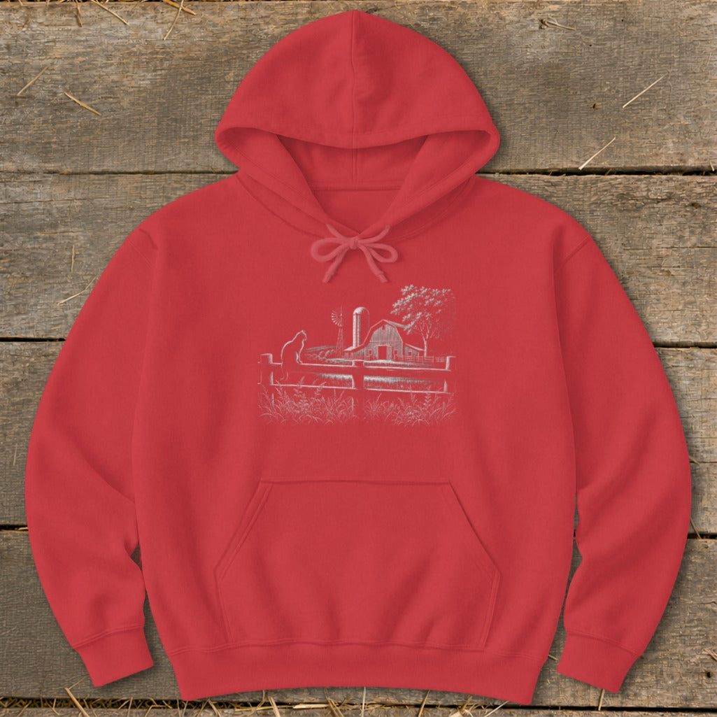 Red hoodie with a white line drawing of a farm scene with a barn and windmill.