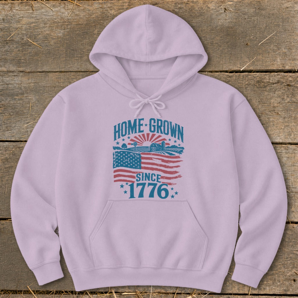 Light purple hoodie with "HOME GROWN SINCE 1776" text and American flag graphic.