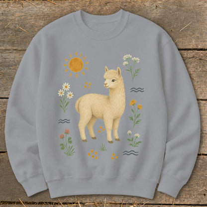 Light grey crewneck sweatshirt with a cream alpaca surrounded by flowers and the sun.