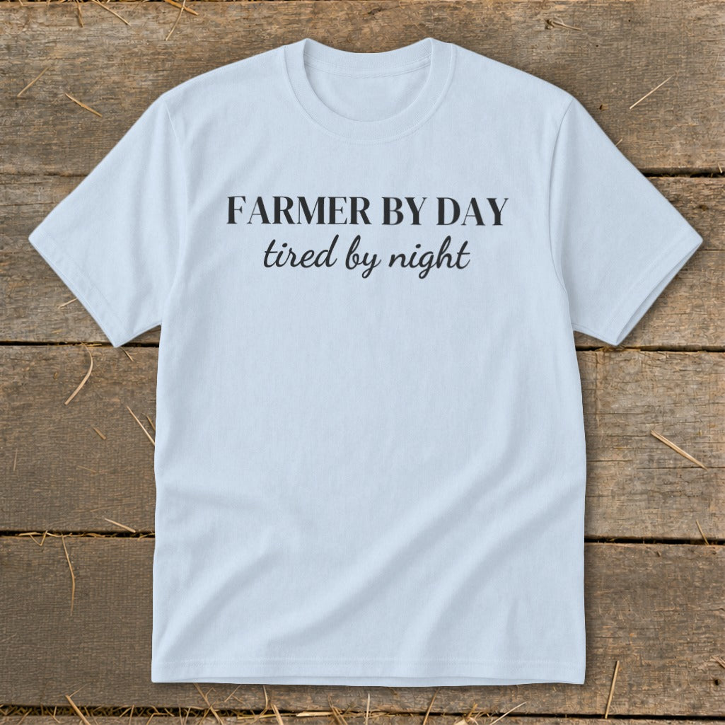 Light blue t-shirt with black text "Farmer by day tired by night".