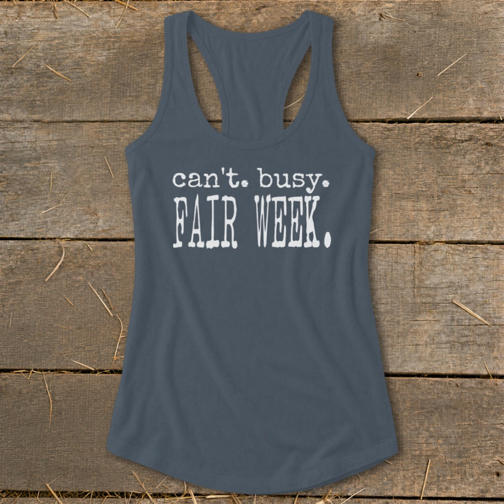 Grey tank top with "can't. busy. FAIR WEEK." printed in white.