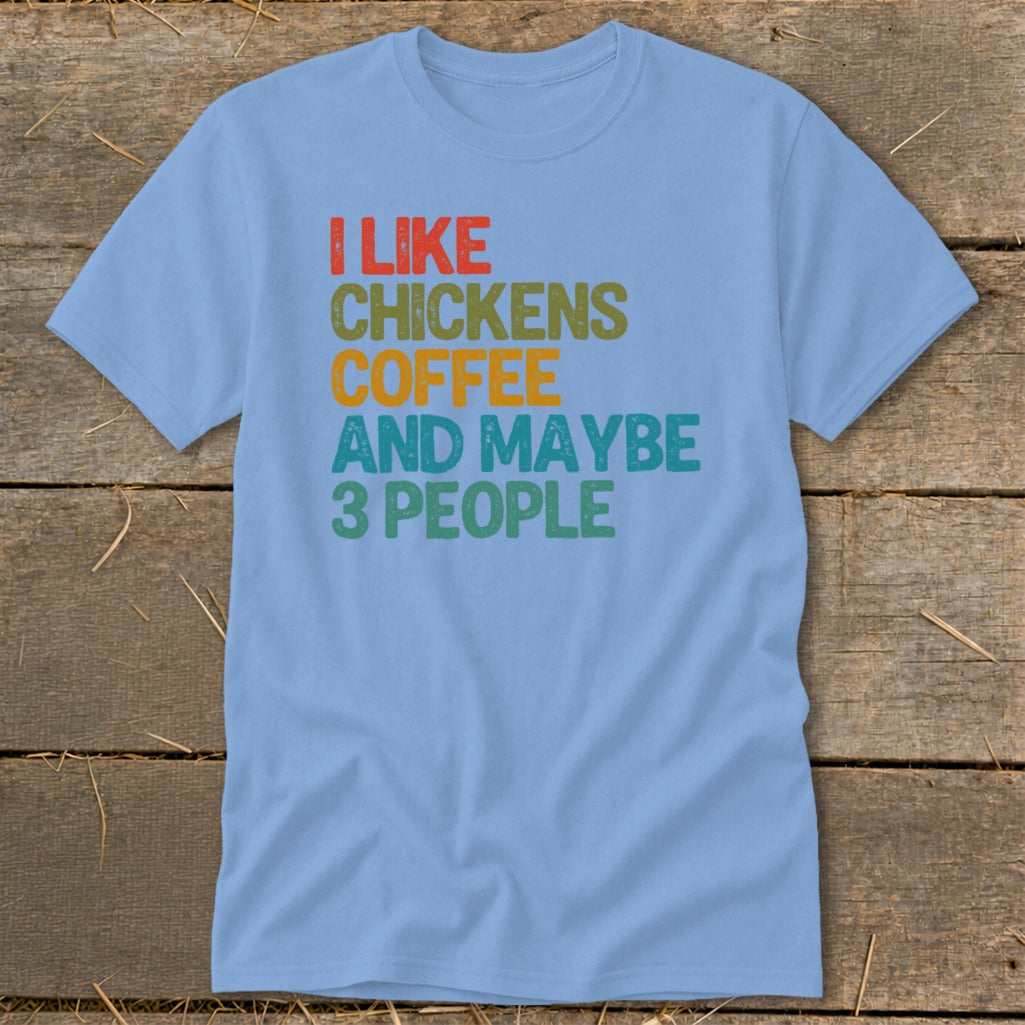 Light blue t-shirt with text "I like chickens coffee and maybe 3 people."