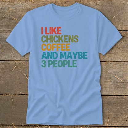 Light blue t-shirt with text "I like chickens coffee and maybe 3 people."