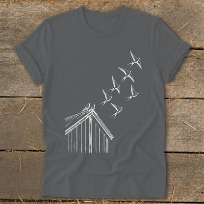 Dark gray t-shirt featuring a white line drawing of birds flying from a rooftop.