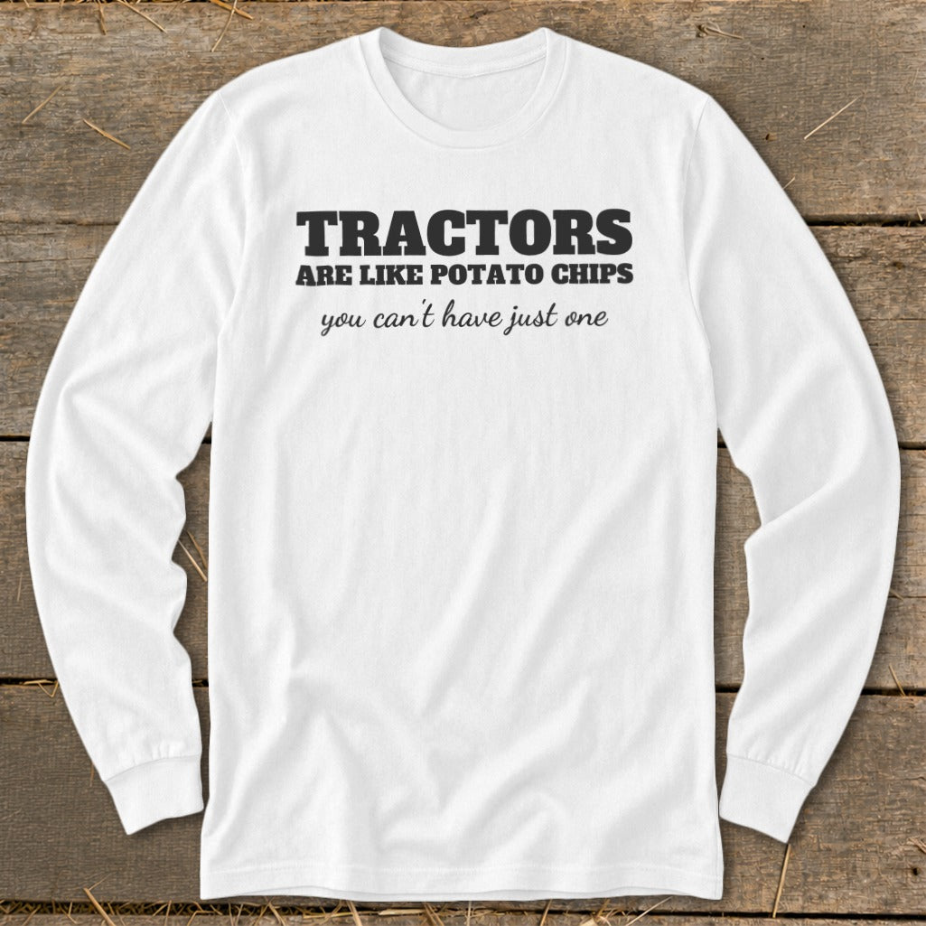 White long-sleeve shirt with black text: "Tractors are like potato chips, you can't have just one."