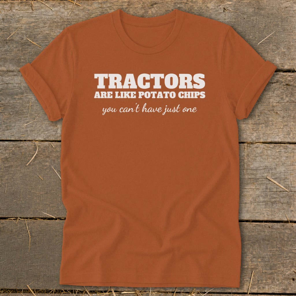 Orange t-shirt with text "Tractors are like potato chips you can't have just one".