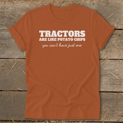 Orange t-shirt with text "Tractors are like potato chips you can't have just one".