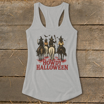 Women's tank top with "Howdy Halloween" text and witches riding horses graphic.