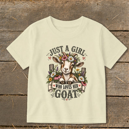 Cream t-shirt with a goat wearing a flower crown and text "JUST A GIRL WHO LOVES HER GOAT".