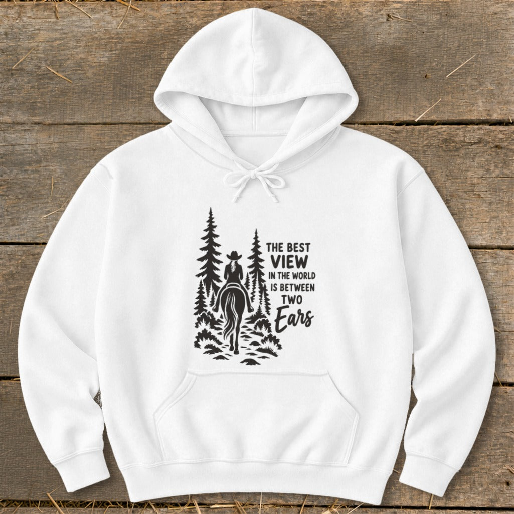A white hooded sweatshirt with a black graphic of a horseback rider and trees on the front.