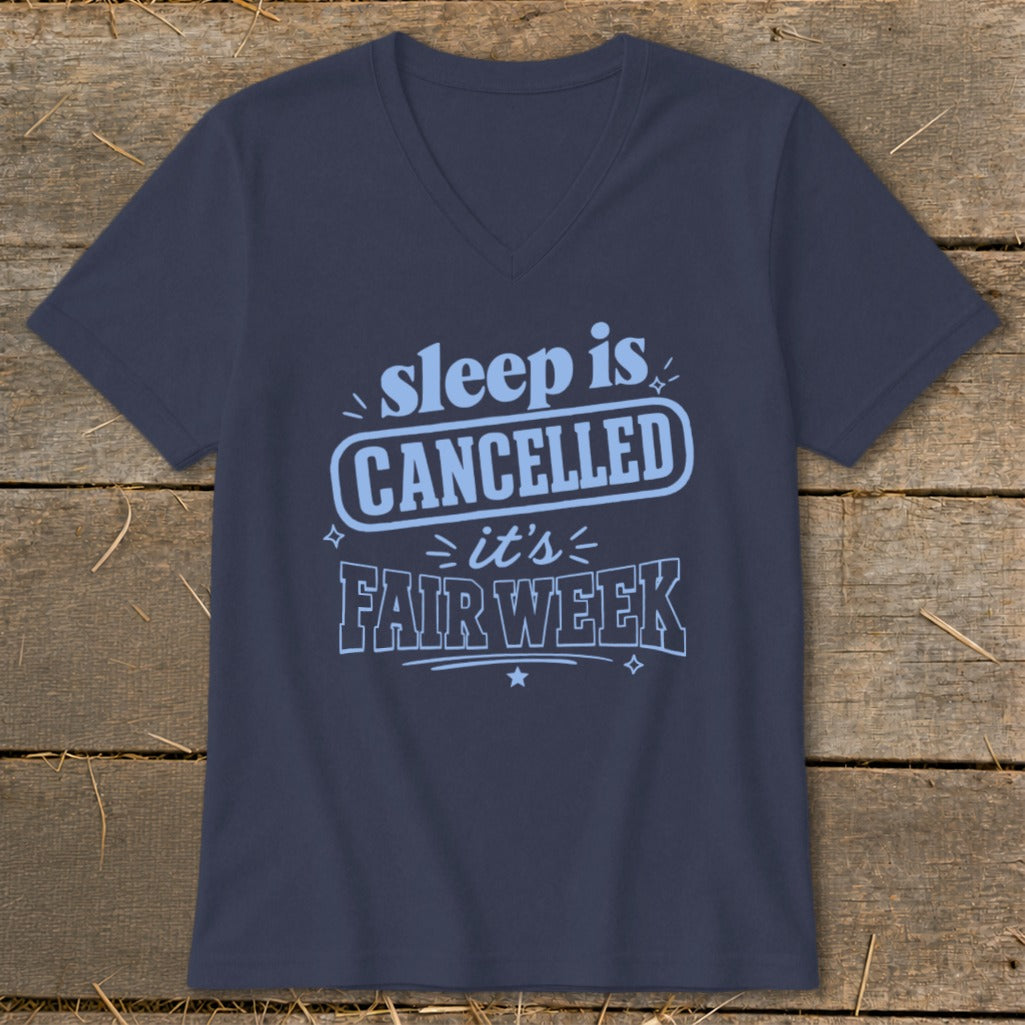 Navy t-shirt with light blue text reading "sleep is CANCELLED it's FAIR WEEK".