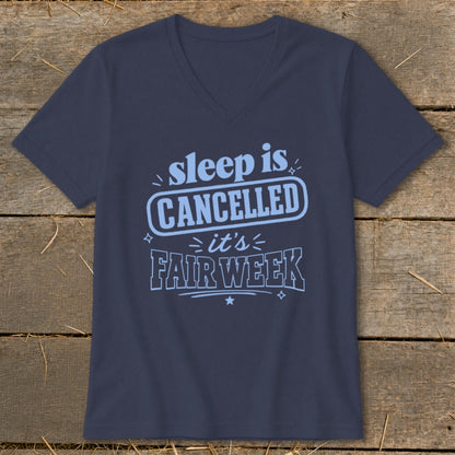 Navy t-shirt with light blue text reading "sleep is CANCELLED it's FAIR WEEK".