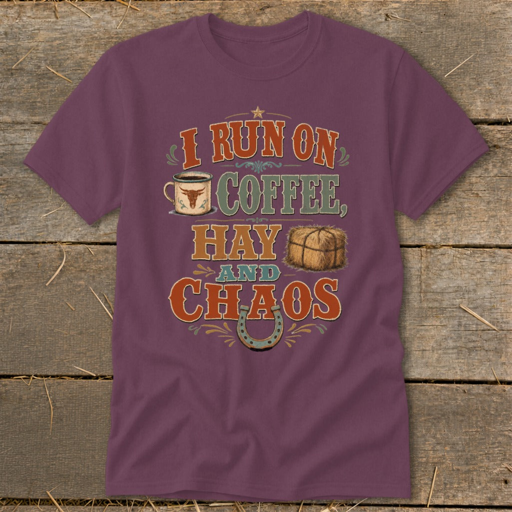 T-shirt with "I run on coffee, hay and chaos" text, coffee cup, hay bale, and horseshoe.