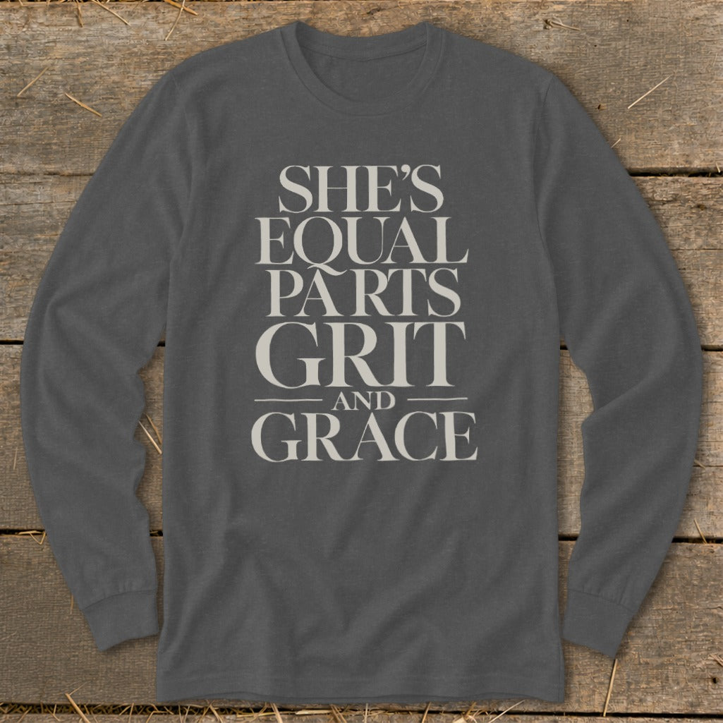 Long sleeve dark grey shirt with "She's Equal Parts Grit and Grace" text.