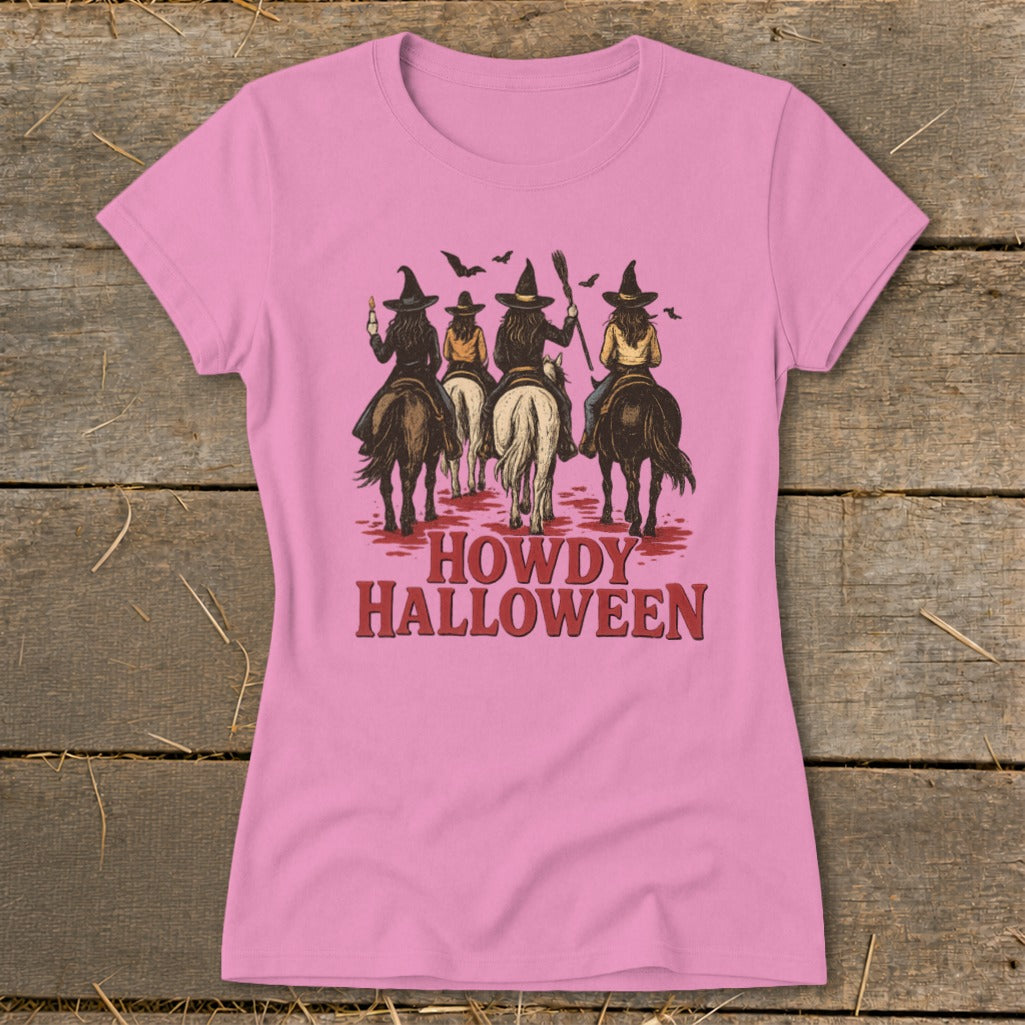Witches on horseback with "Howdy Halloween" text.