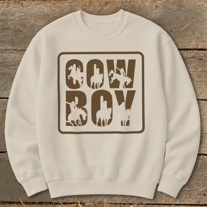 Cream sweatshirt with "COWBOY" text and cowboy silhouette graphics.