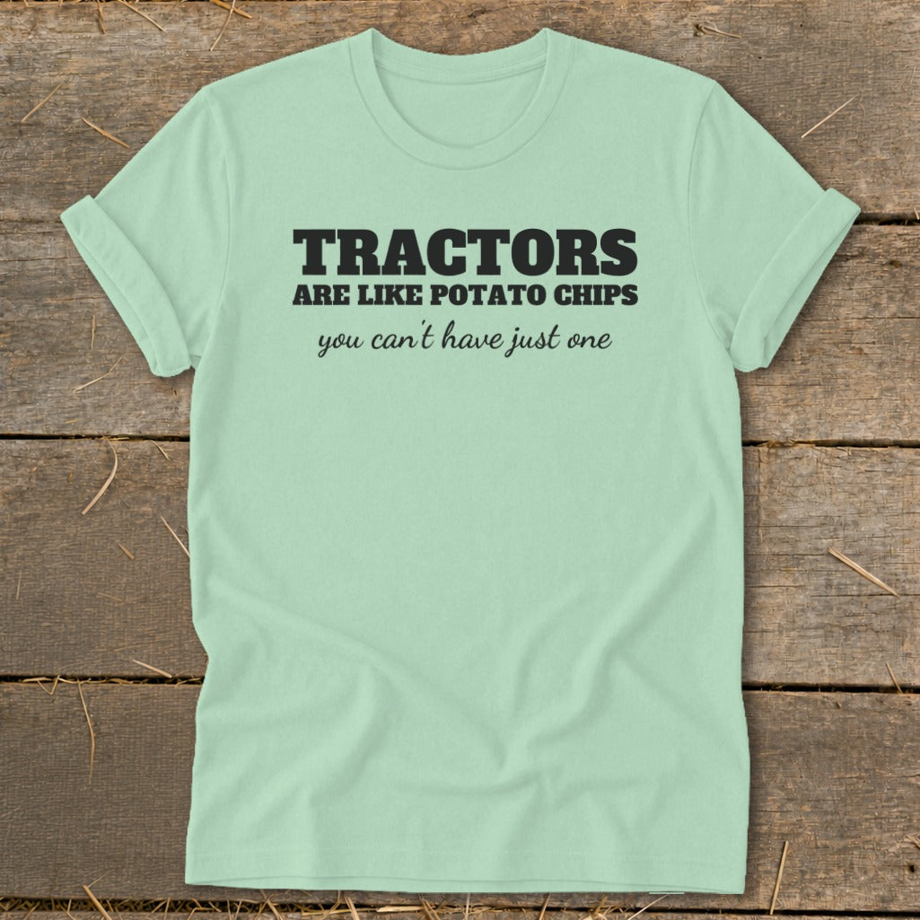 Light green t-shirt with black text: "Tractors are like potato chips you can't have just one".