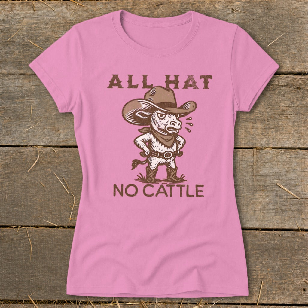 Pink t-shirt with brown graphic of a bull wearing a cowboy hat and bandana, text says "ALL HAT NO CATTLE".
