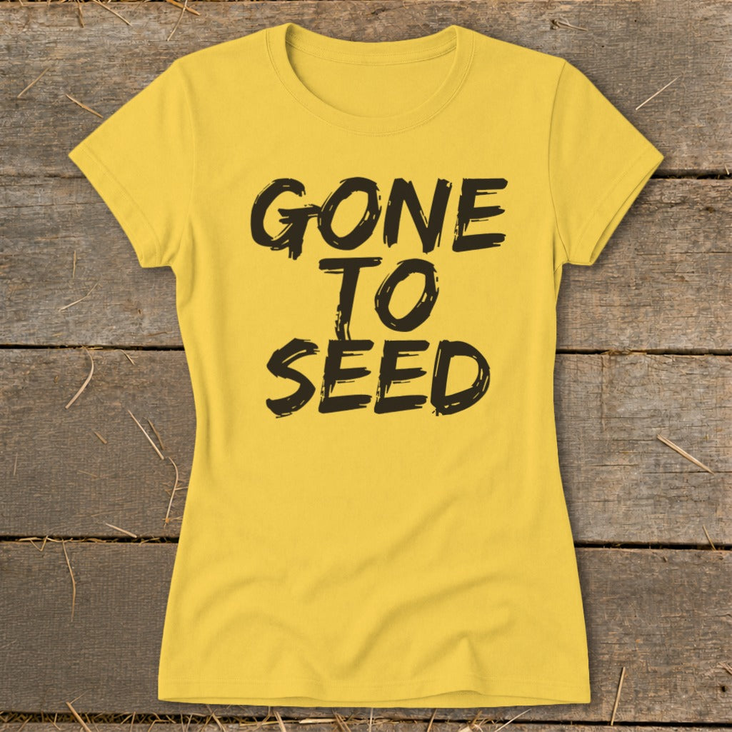 Yellow t-shirt with black text that reads "GONE TO SEED".