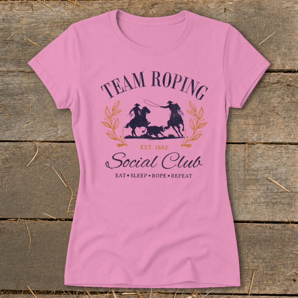 Pink t-shirt with "Team Roping Social Club Est. 1882" and rodeo graphic.