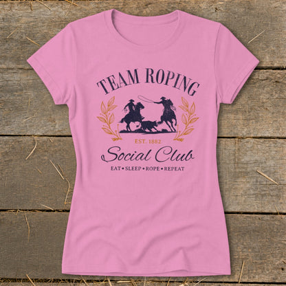 Pink t-shirt with "Team Roping Social Club Est. 1882" and rodeo graphic.