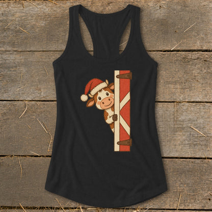 Black tank top with a cute cow wearing a Santa hat peeking around a barn door.