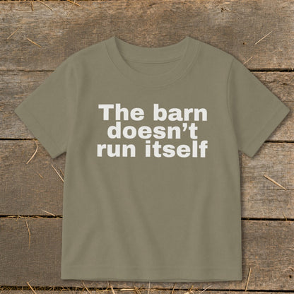 Khaki t-shirt with white text that reads "The barn doesn't run itself."