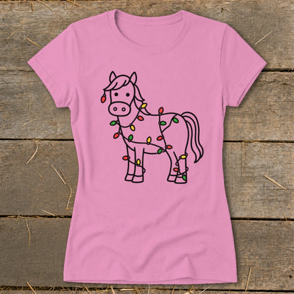 Pink t-shirt with a line drawing of a horse wrapped in Christmas lights.