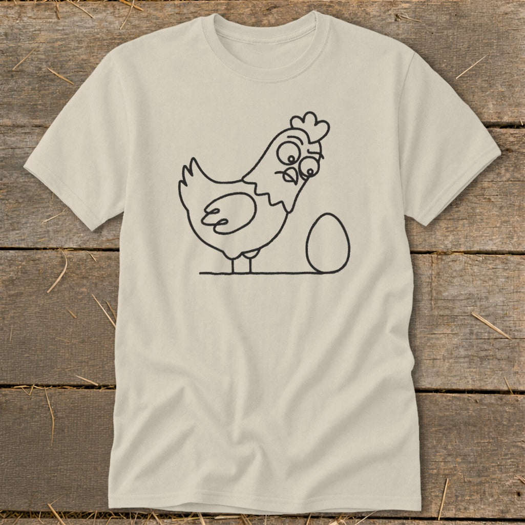 Line art of a surprised chicken looking at an egg on a tan t-shirt.
