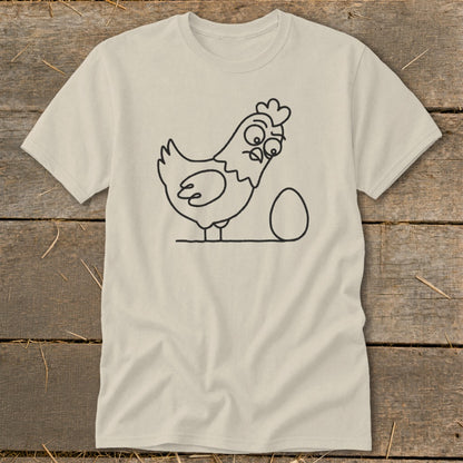 Line art of a surprised chicken looking at an egg on a tan t-shirt.