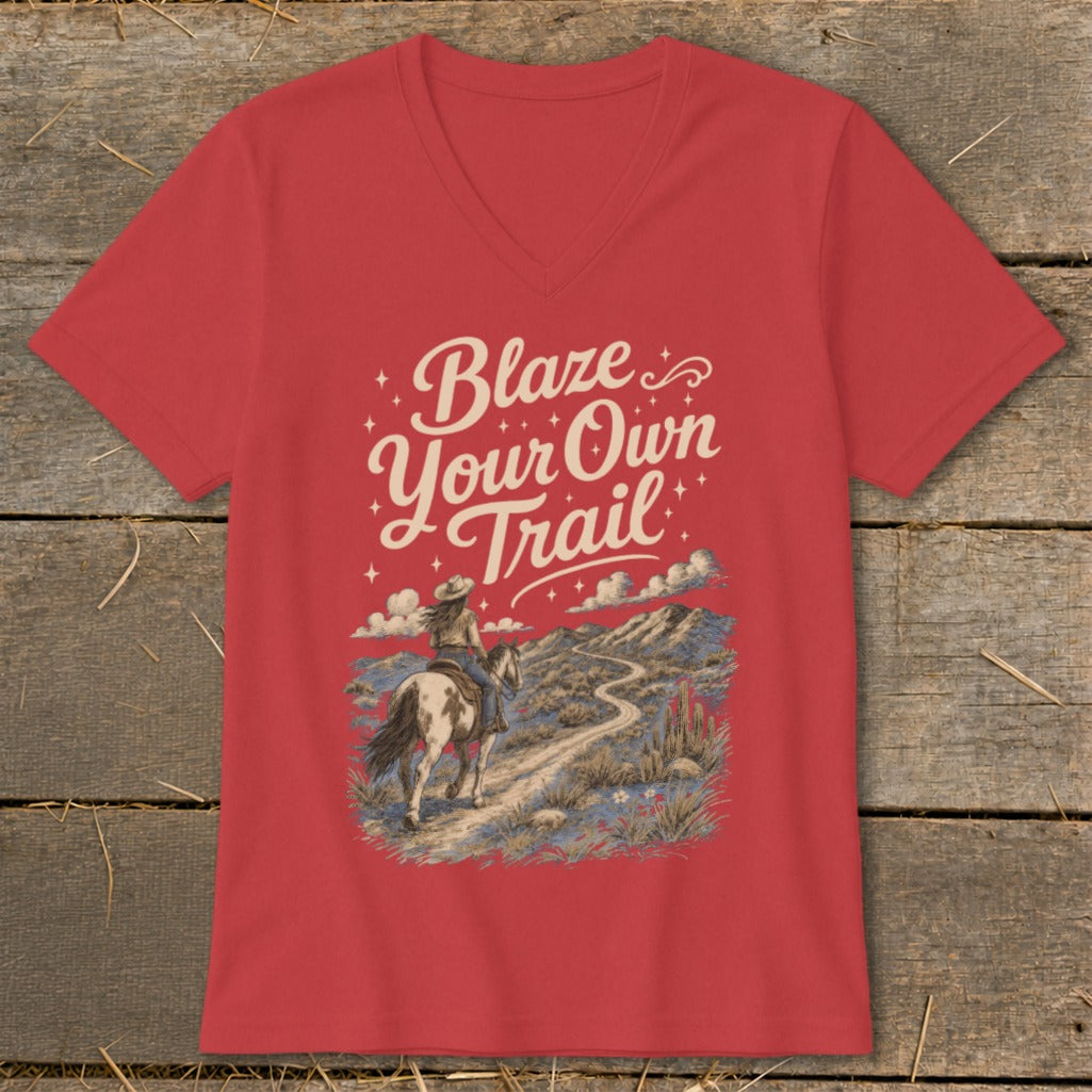 Red v-neck t-shirt with "Blaze Your Own Trail" graphic and horseback rider.