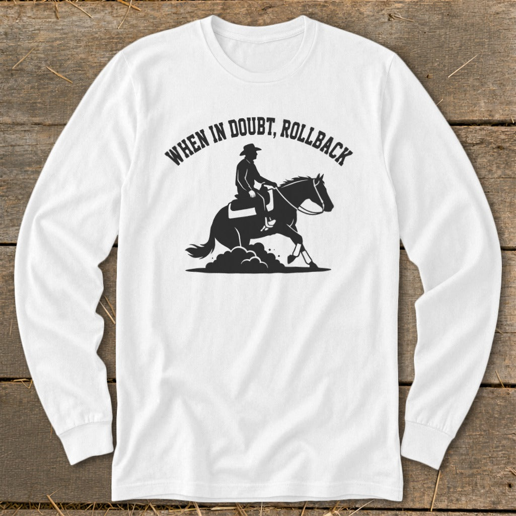 White long sleeve shirt with black graphic of a cowboy on a horse and text "When in doubt, rollback."