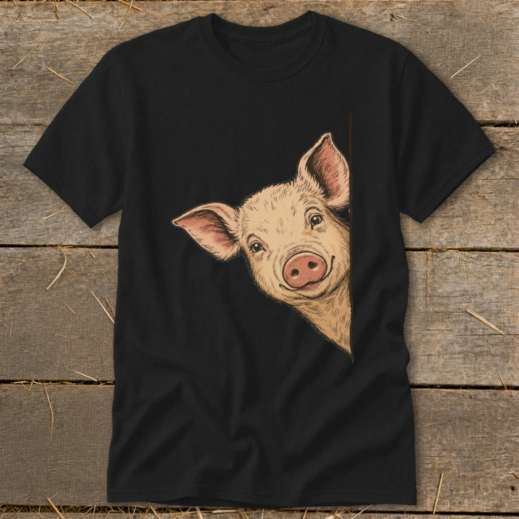 Black t-shirt with a drawing of a smiling pig peeking from the side.