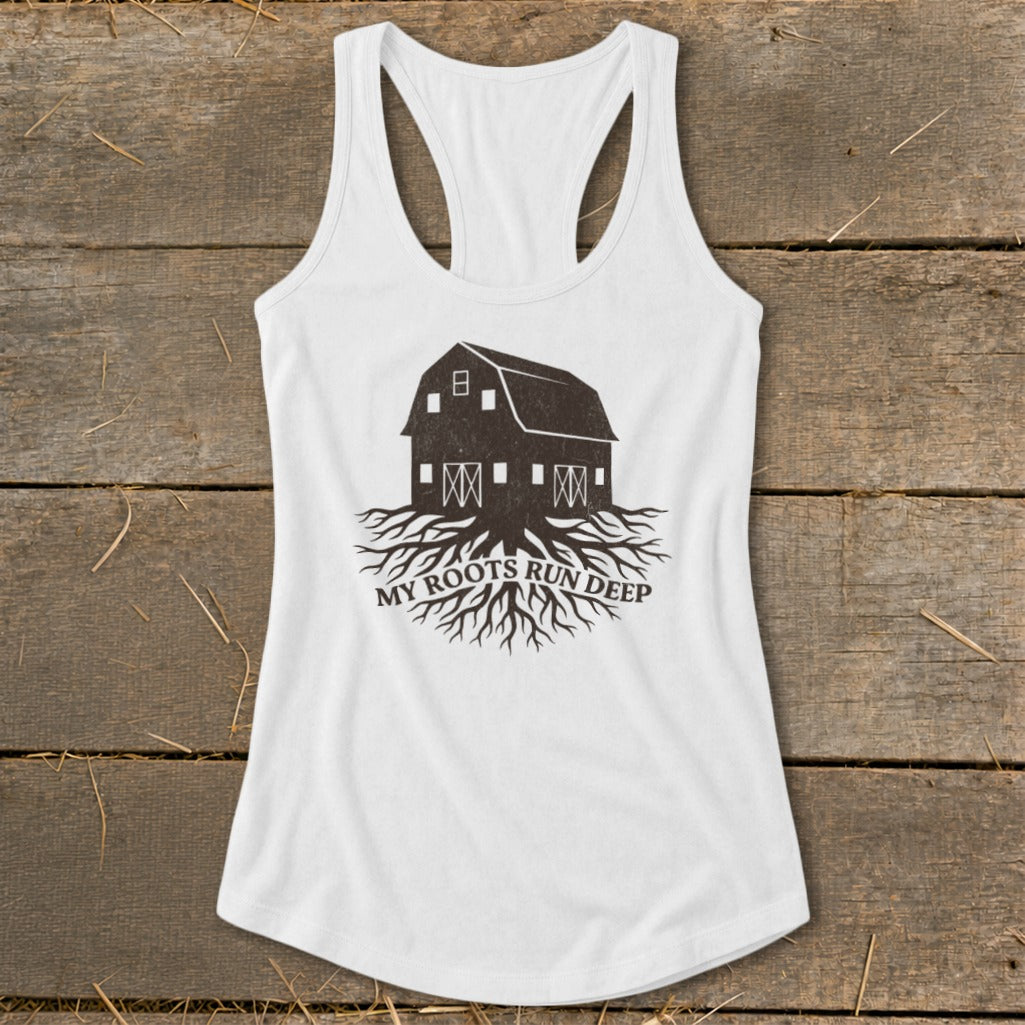White tank top with barn and roots graphic and text "MY ROOTS RUN DEEP."
