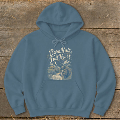 Blue hoodie with "Barn Hair, Full Heart" graphic showing a woman and horse.