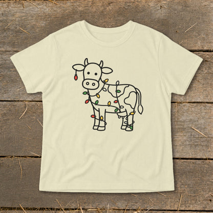 Light cream t-shirt with black line drawing of a cow covered in colorful Christmas lights.