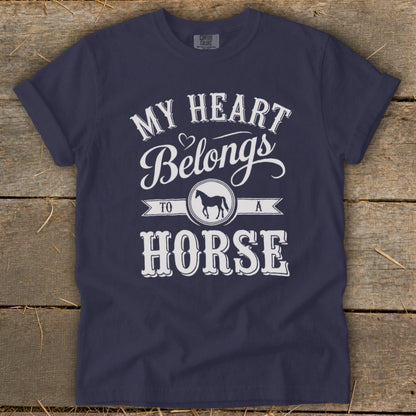 Navy t-shirt with "My Heart Belongs To A Horse" text and horse silhouette.