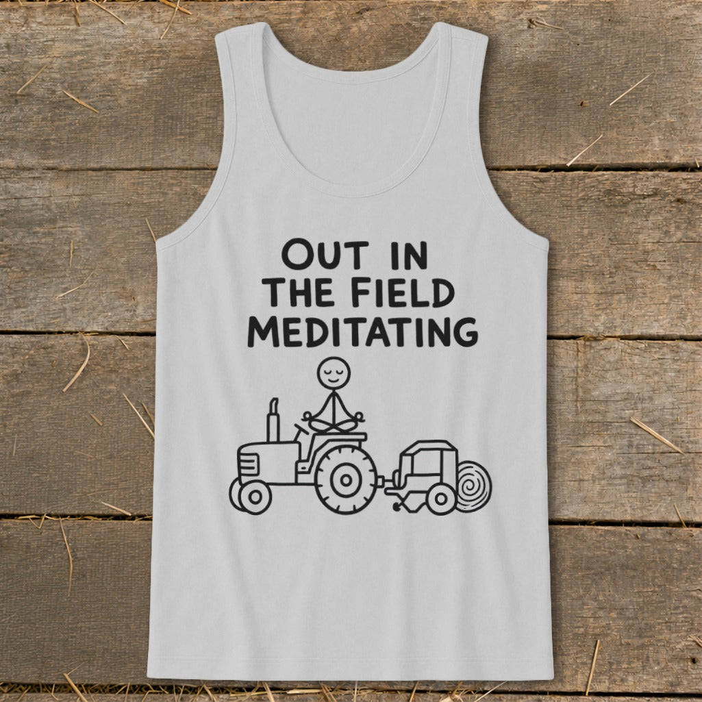 Gray tank top with black text and illustration of stick figure meditating on a tractor.