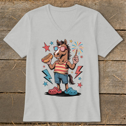 Cartoon horse in sunglasses holding hot dog and sparkler, with fireworks and lightning bolts.