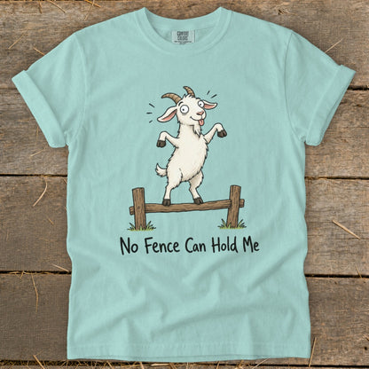 Light blue t-shirt with cartoon goat on fence, "No Fence Can Hold Me".