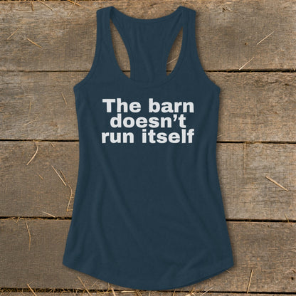 Navy tank top with white text "The barn doesn't run itself".
