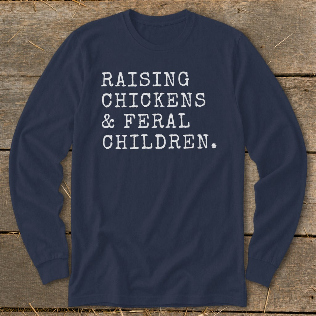 Navy long-sleeve shirt with white text: "RAISING CHICKENS & FERAL CHILDREN."