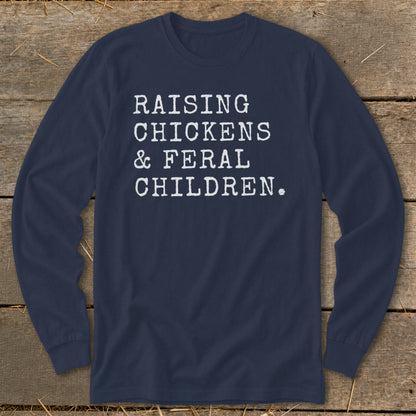 Navy long-sleeve shirt with white text: "RAISING CHICKENS & FERAL CHILDREN."