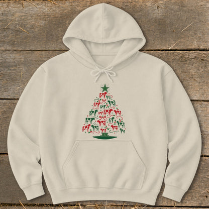 Cream hoodie with a Christmas tree made of red and green cows.
