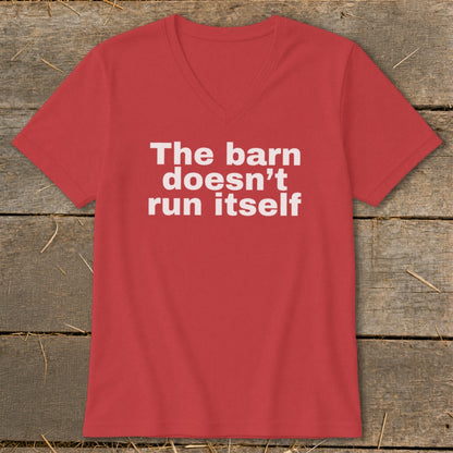 Red v-neck t-shirt with white text that reads "The barn doesn't run itself".
