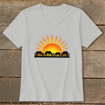 Gray v-neck t-shirt with graphic of horses grazing at sunrise behind a fence.