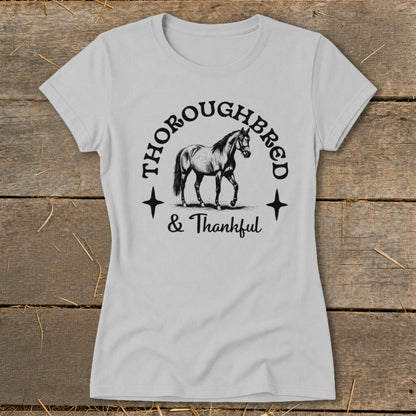 Light gray t-shirt with "THOROUGHBRED & Thankful" text and horse illustration.