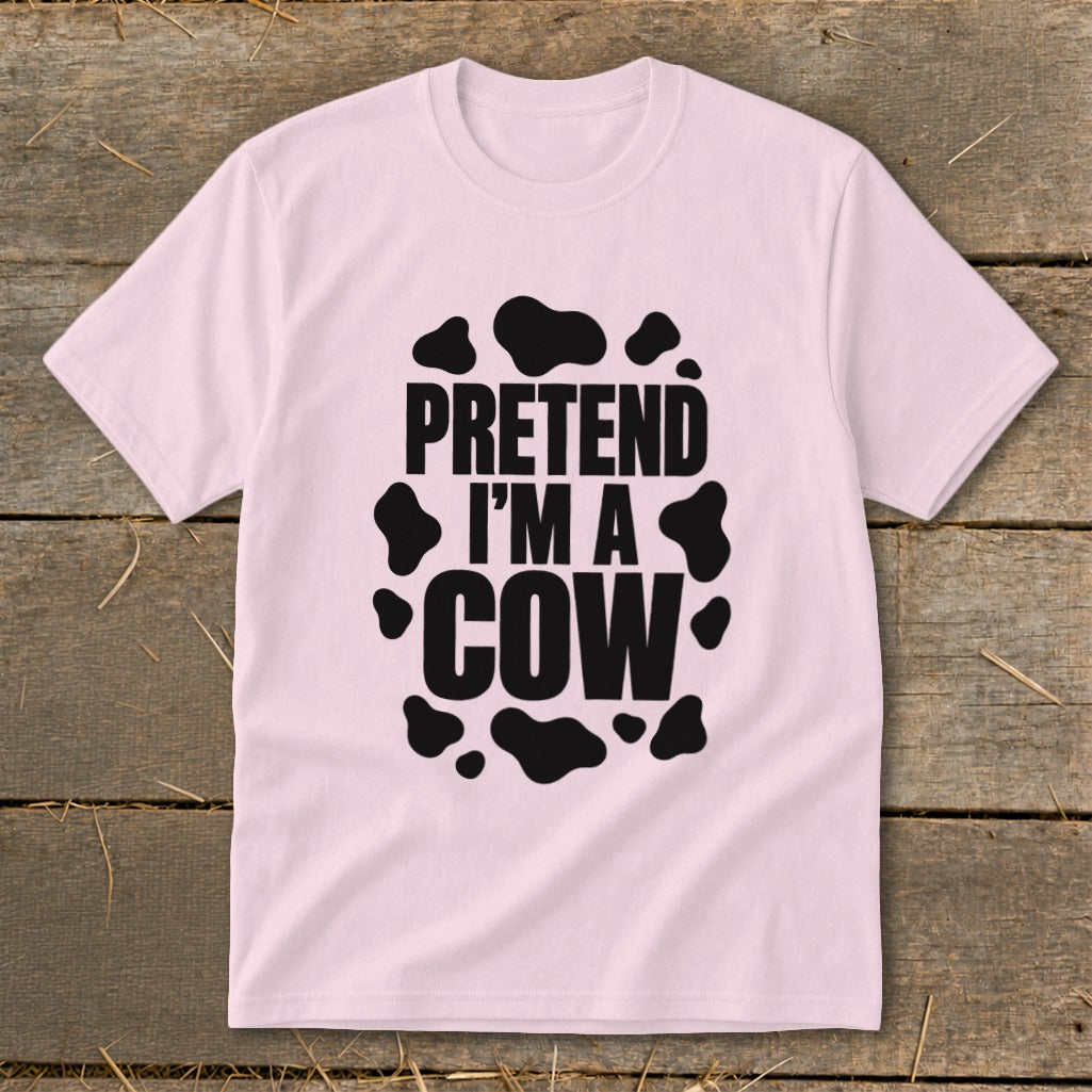 Pink t-shirt with black text "PRETEND I'M A COW" and cow spots.