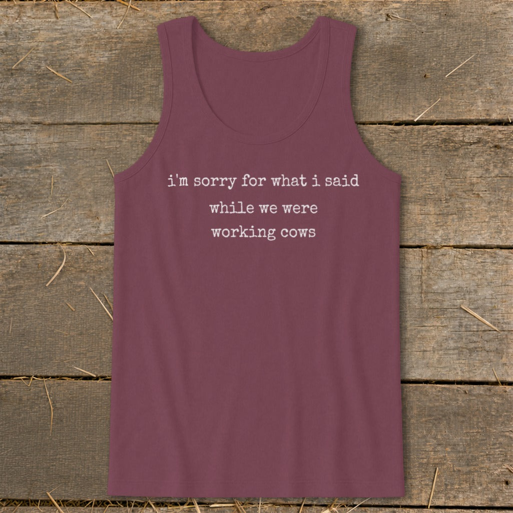 Maroon tank top with white text "i'm sorry for what i said while we were working cows."
